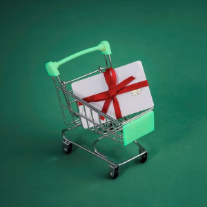 Carrinho de compras com cartão-presente representando campanha de vale-brindes.